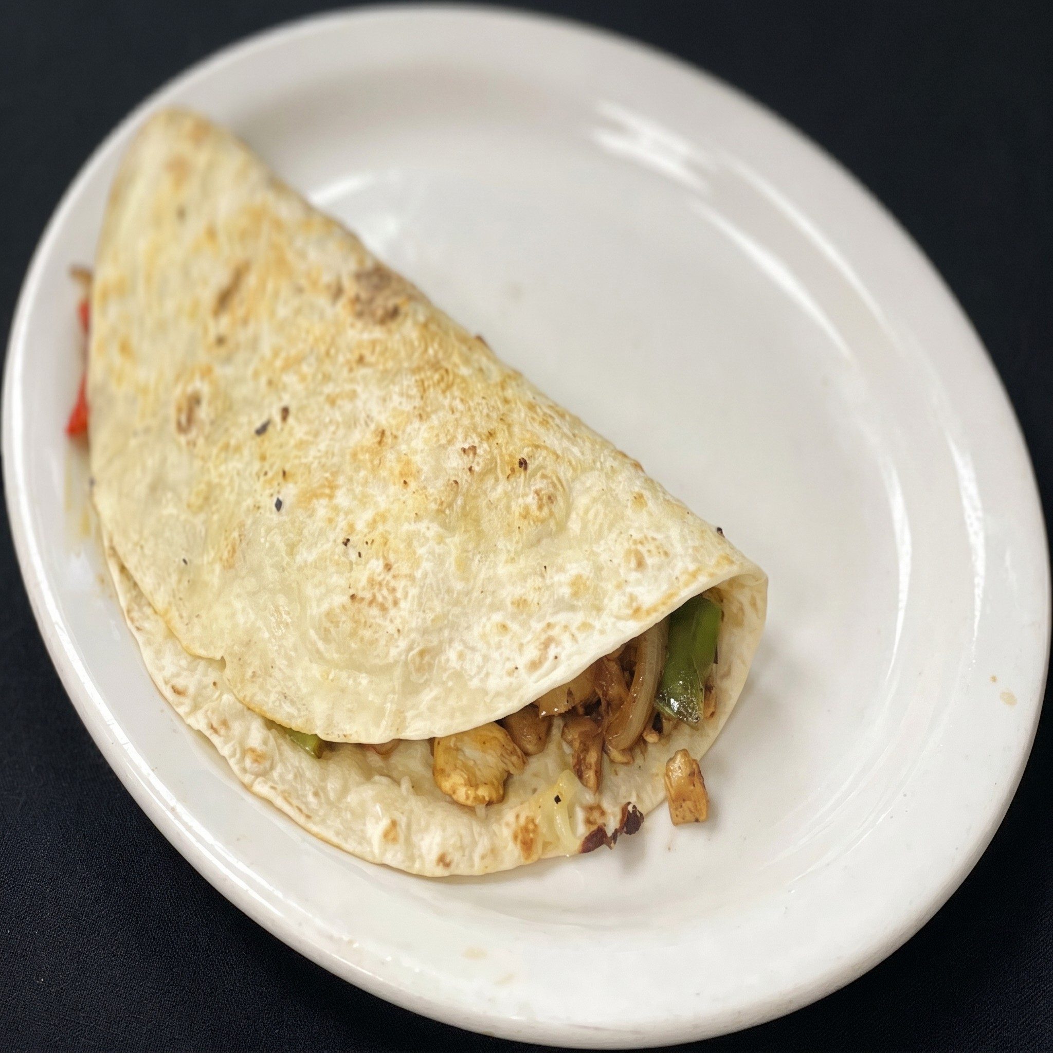 Kid's Certified Angus Beef Taco, Mexican Rice and Refried Beans.